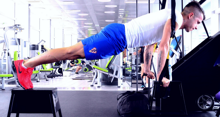 Straight-arm plank (suspended upper,fee elevated)