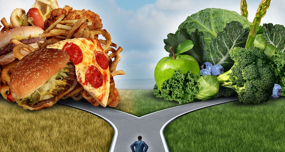 31451433 - diet decision concept and nutrition choices dilemma between healthy good fresh fruit and vegetables or greasy cholesterol rich fast food with a man on a crossroad trying to decide what to eat for the best lifestyle choice.