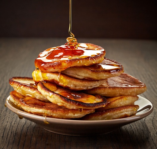 24350726 - pancakes with maple syrup on plate